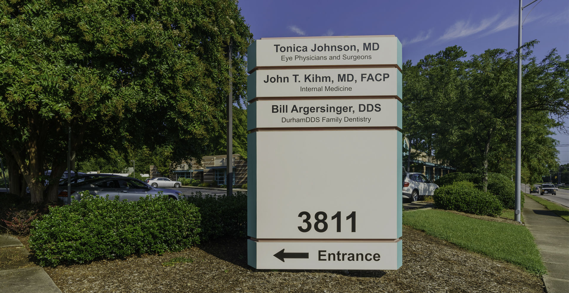 Building exterior and sign for Durham DDS